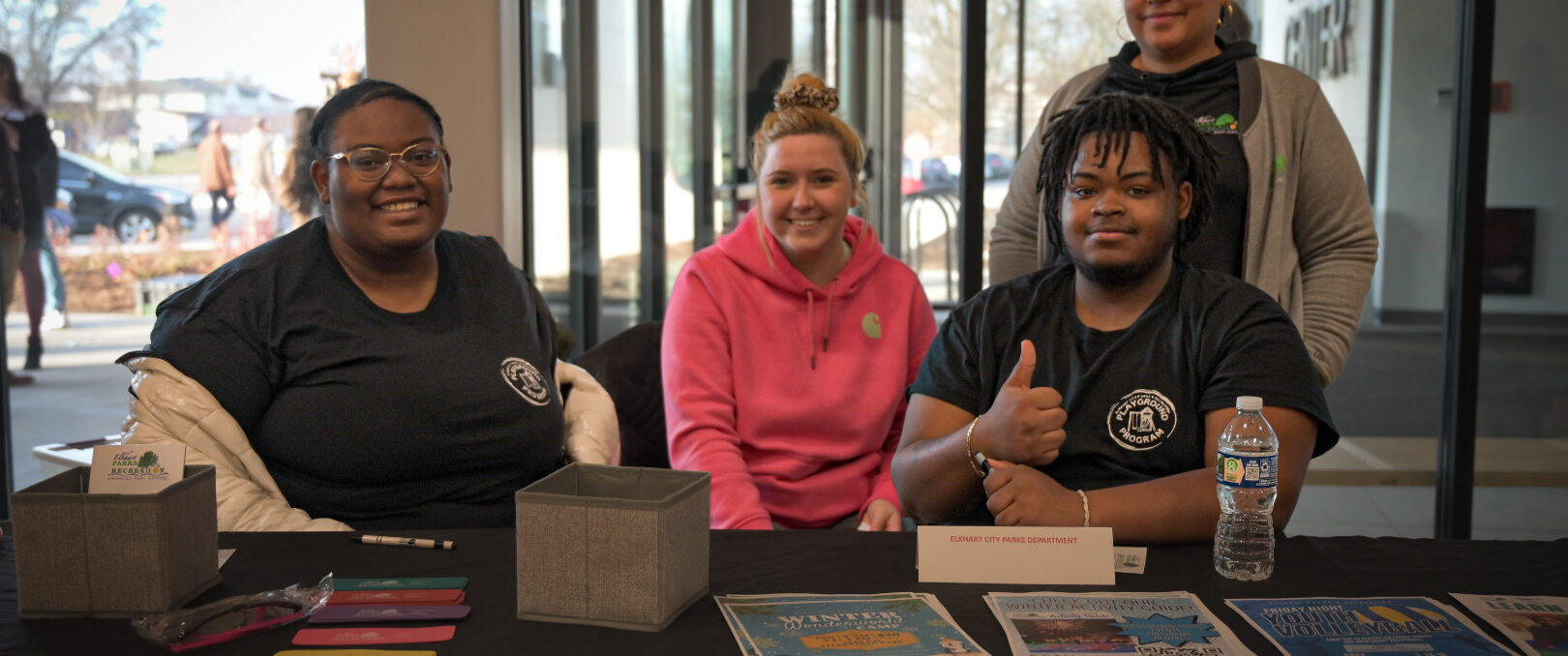 Parks and Recreation staff sitting at a table.